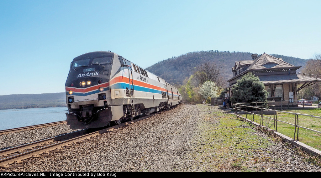 AMTK 130 - the 40th Anniversary Unit leads the westbound Pennsylvanian past the ex-PRR passenger depot in Duncannon